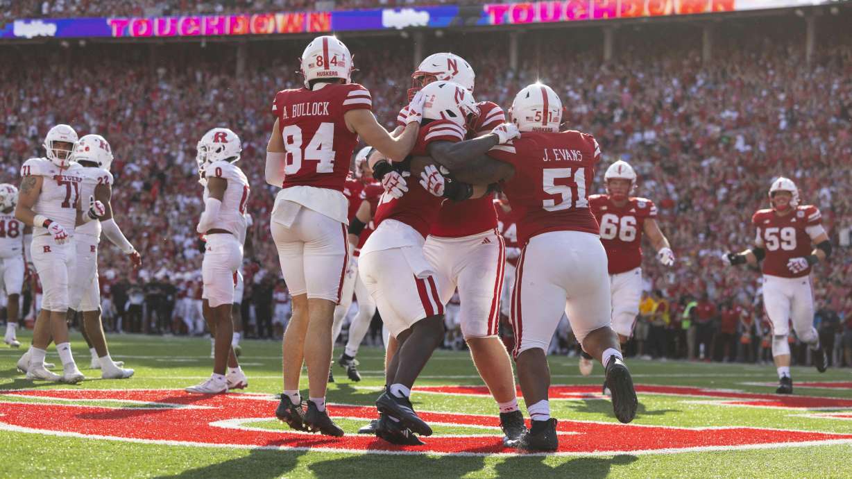 From left, Nebraska's Alex Bullock, Janiran Bonner, Bryce Benhart and Justin Evans Rutgers celebrate Bonner's touchdown against Rutgers during the first half of an NCAA college football game Saturday, Oct. 5, 2024, in Lincoln, Neb.