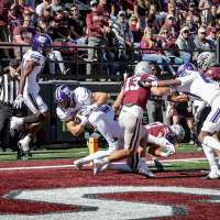 Munoz throws 6 TDs, including game-winner in OT, as Weber State holds off Montana