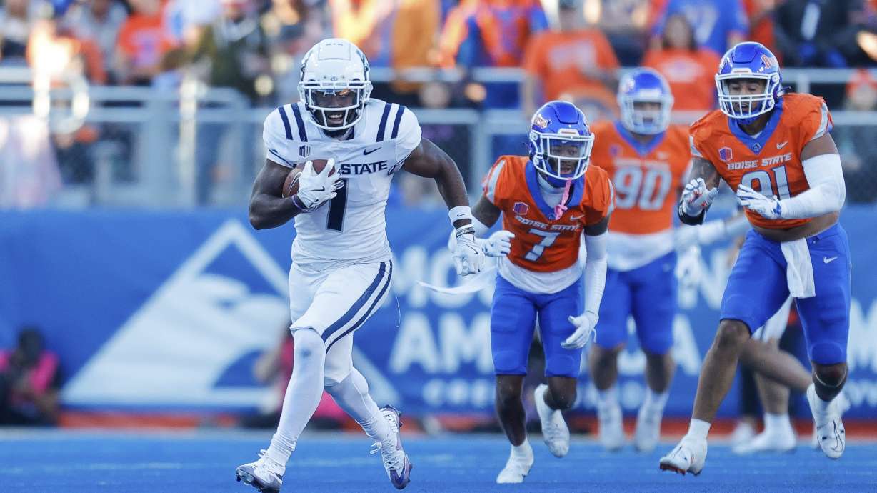 Utah State wide receiver Jalen Royals (1) turns up field after a reception against Boise State in the first half of an NCAA college football game, Saturday, Oct. 5, 2024, in Boise, Idaho. .