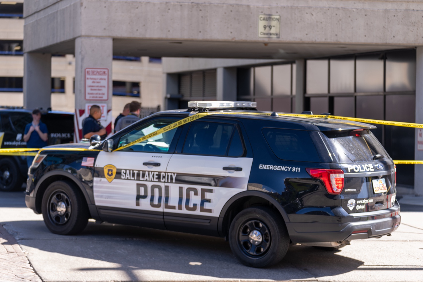 A Salt Lake City Police Department patrol car parked on the sidewalk near 185 S. State as officers and department’s crime lab technicians discuss a homicide investigation in Salt Lake City on Oct. 5.