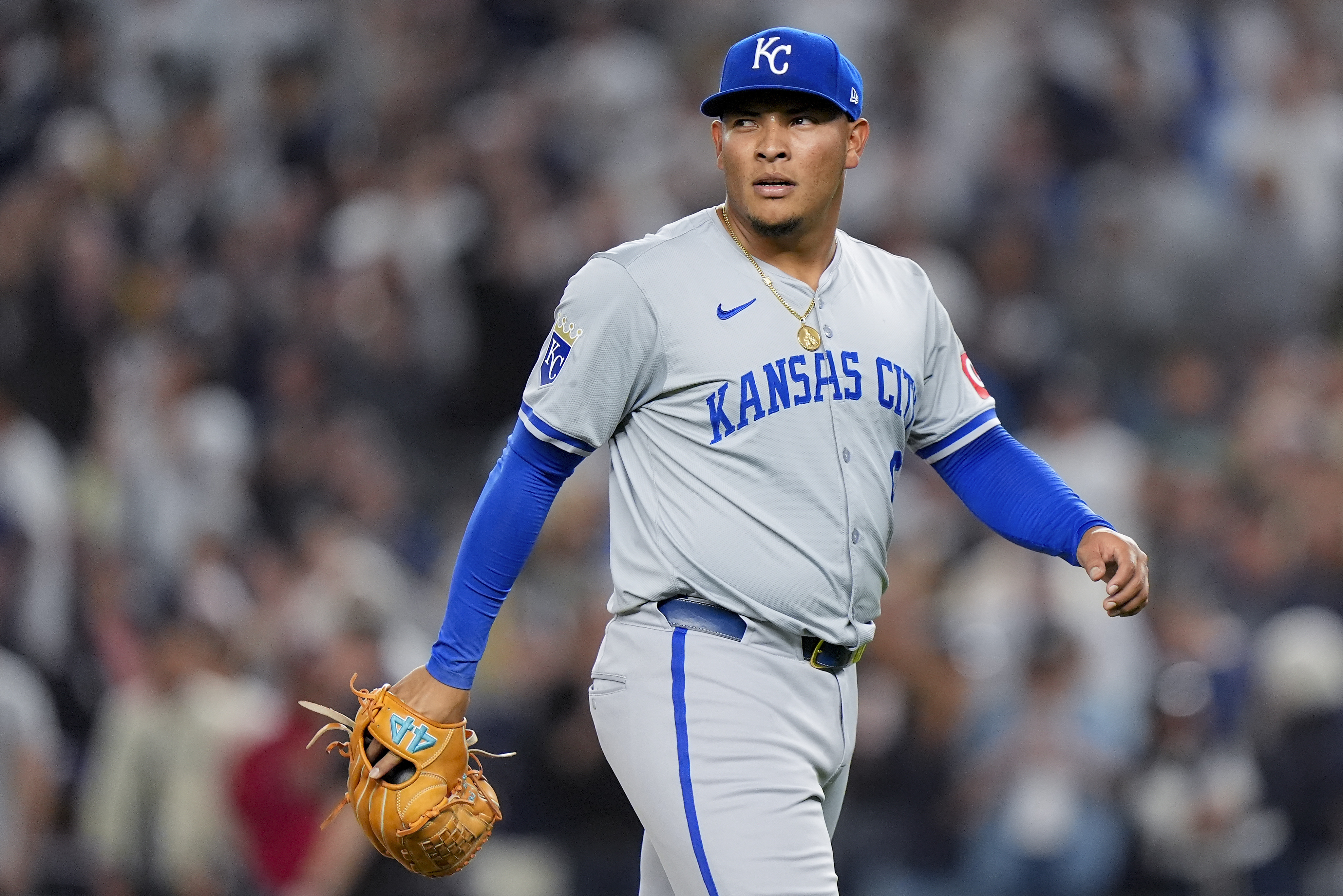 Kansas City Royals pitcher Angel Zerpa walks off the field after walking home a run against the New York Yankees during the fifth inning of Game 1 of the American League baseball division series, Saturday, Oct. 5, 2024, in New York.