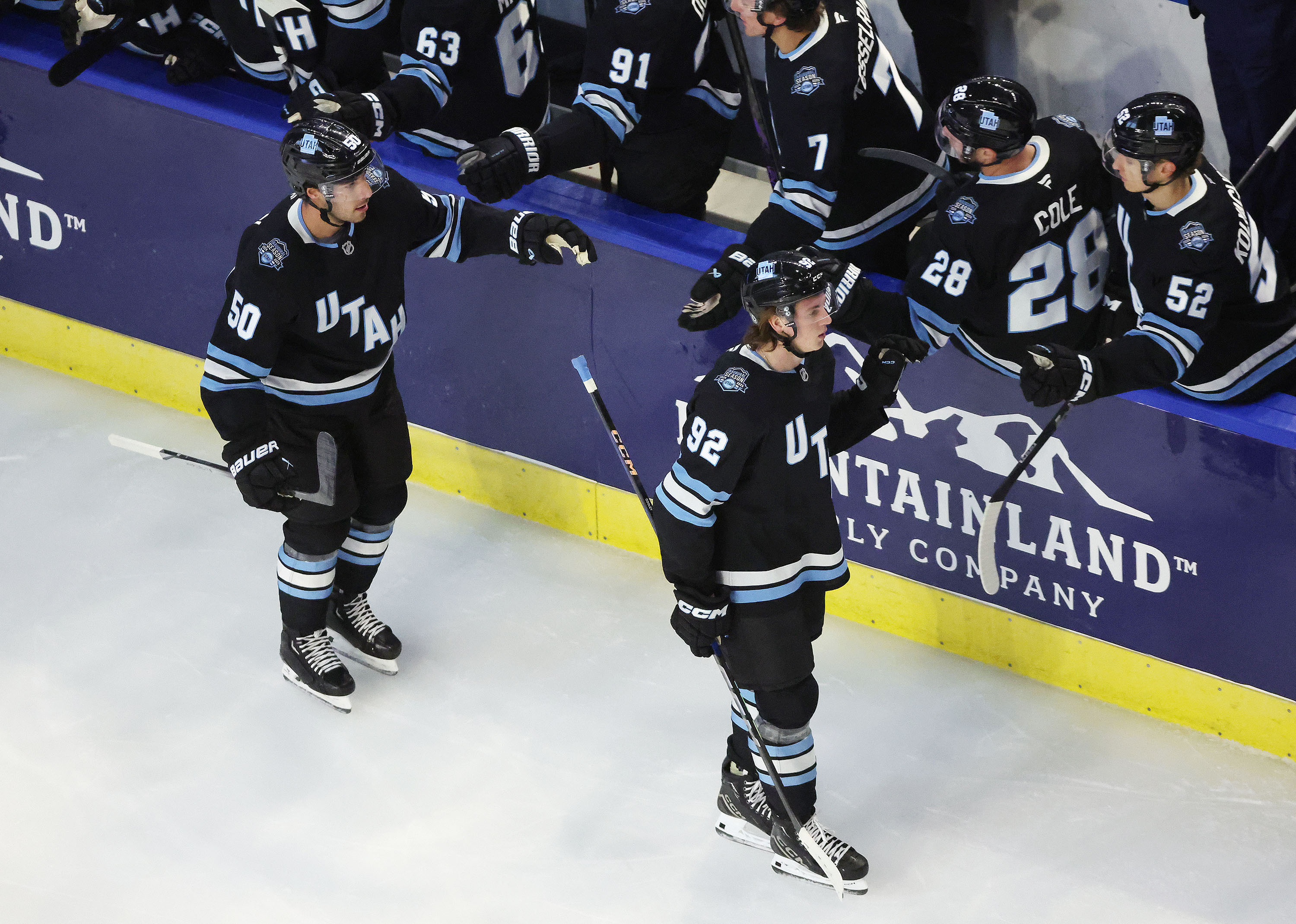 The Utah Hockey Club celebrate a goal against the Colorado Avalanche at the Maverik Center in West Valley City on Saturday, Oct. 5, 2024.