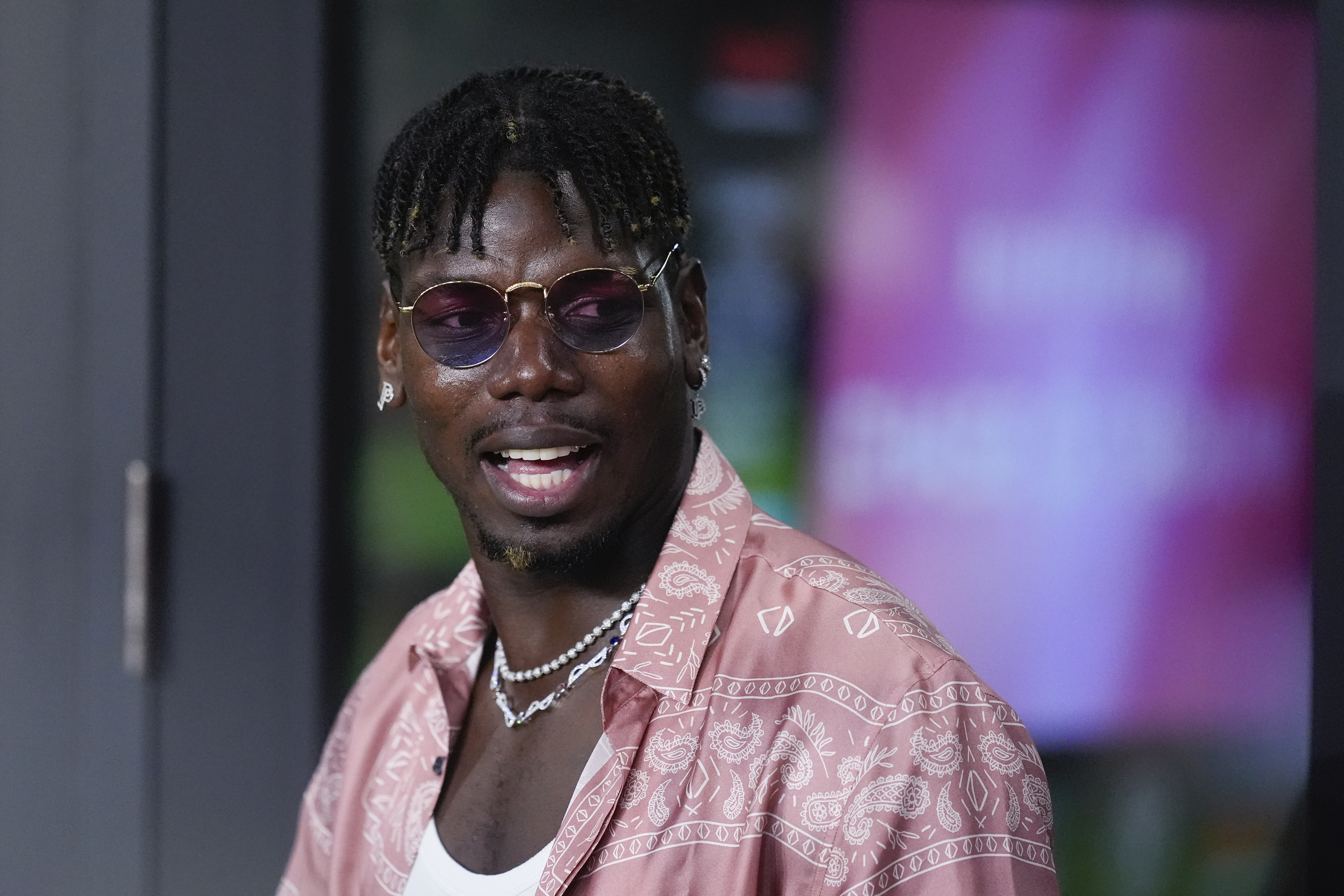 French professional soccer player Paul Pogba stands in a VIP suite at the start of an MLS soccer match between Inter Miami and Charlotte FC, Saturday, Sept. 28, 2024, in Fort Lauderdale, Fla.