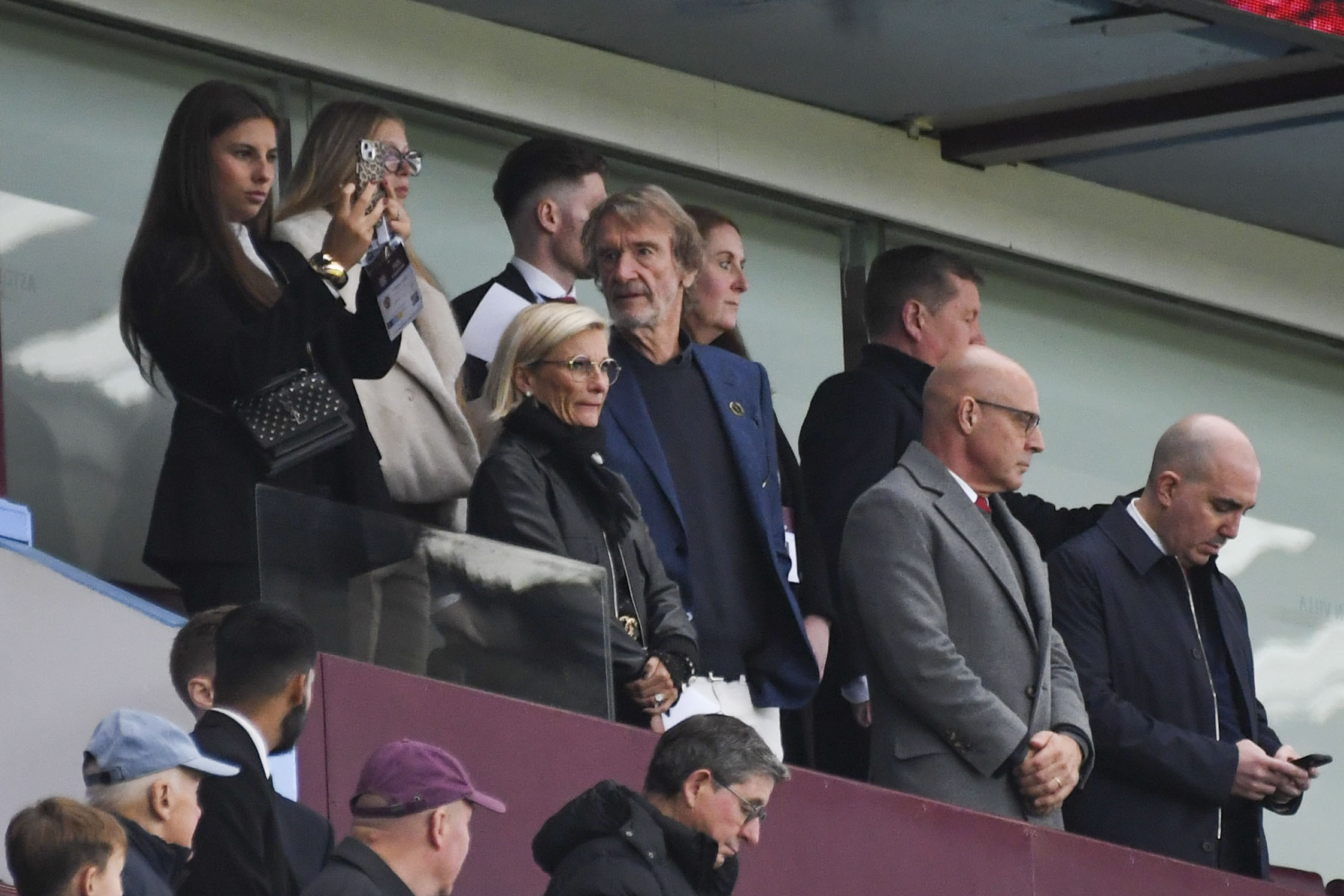 Manchester United owner Sir Jim Ratcliffe, center, looks out from the stands prior the English Premier League soccer match between Aston Villa and Manchester United, at Villa Park in Birmingham, England, Sunday, Oct. 6, 2024.