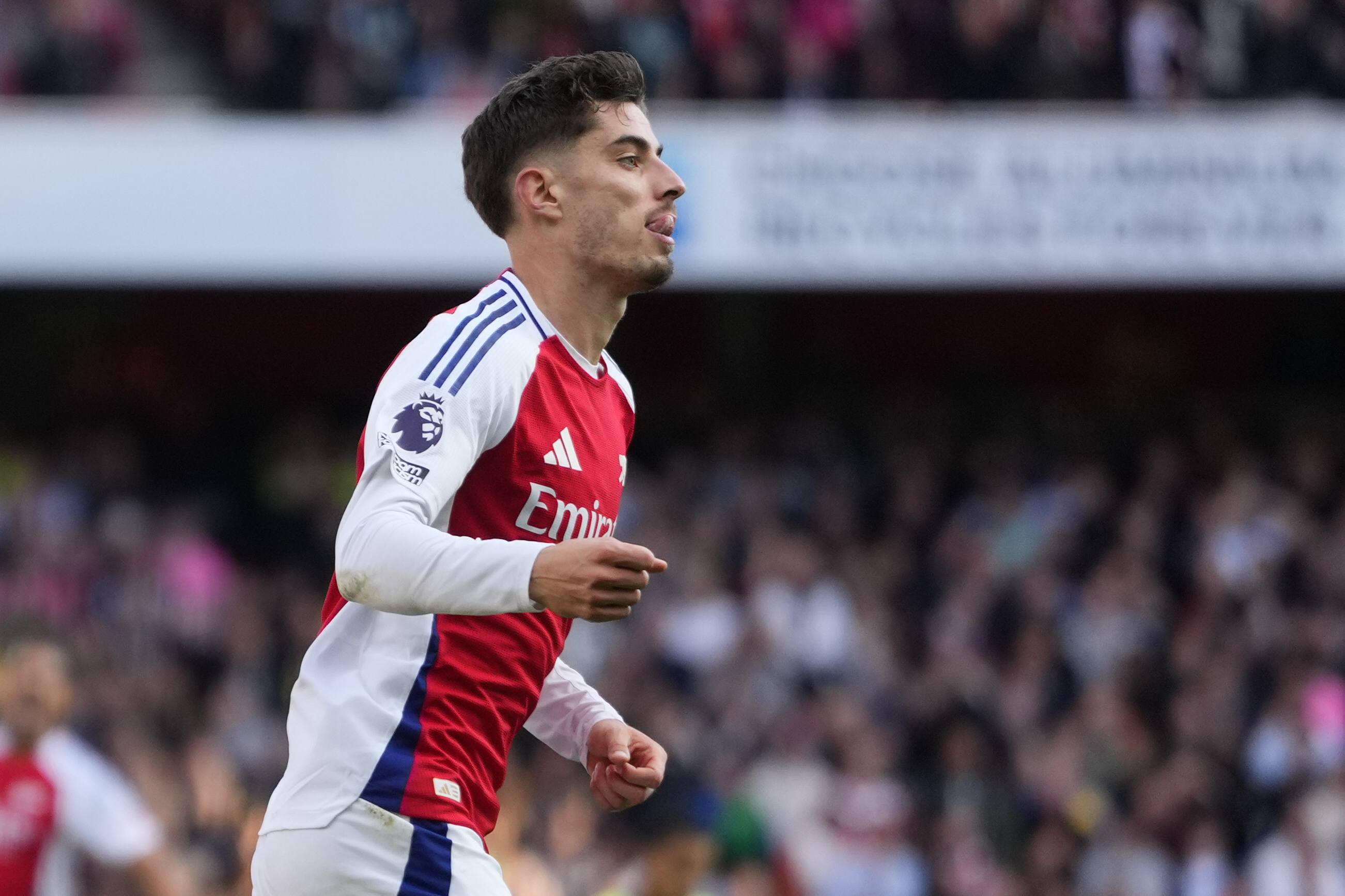 Arsenal's Kai Havertz celebrates after scoring his side's opening goal during the English Premier League soccer match between Arsenal and Southampton at the Emirates Stadium in London, Saturday, Oct. 5, 2024.