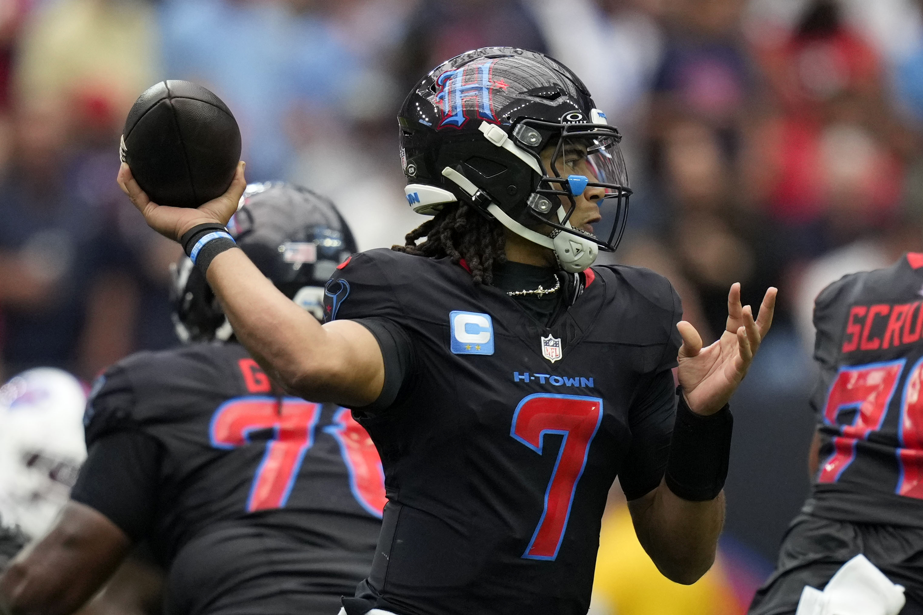 Houston Texans quarterback C.J. Stroud (7) throws a pass during the first half of an NFL football game against the Buffalo Bills, Sunday, Oct. 6, 2024, in Houston.