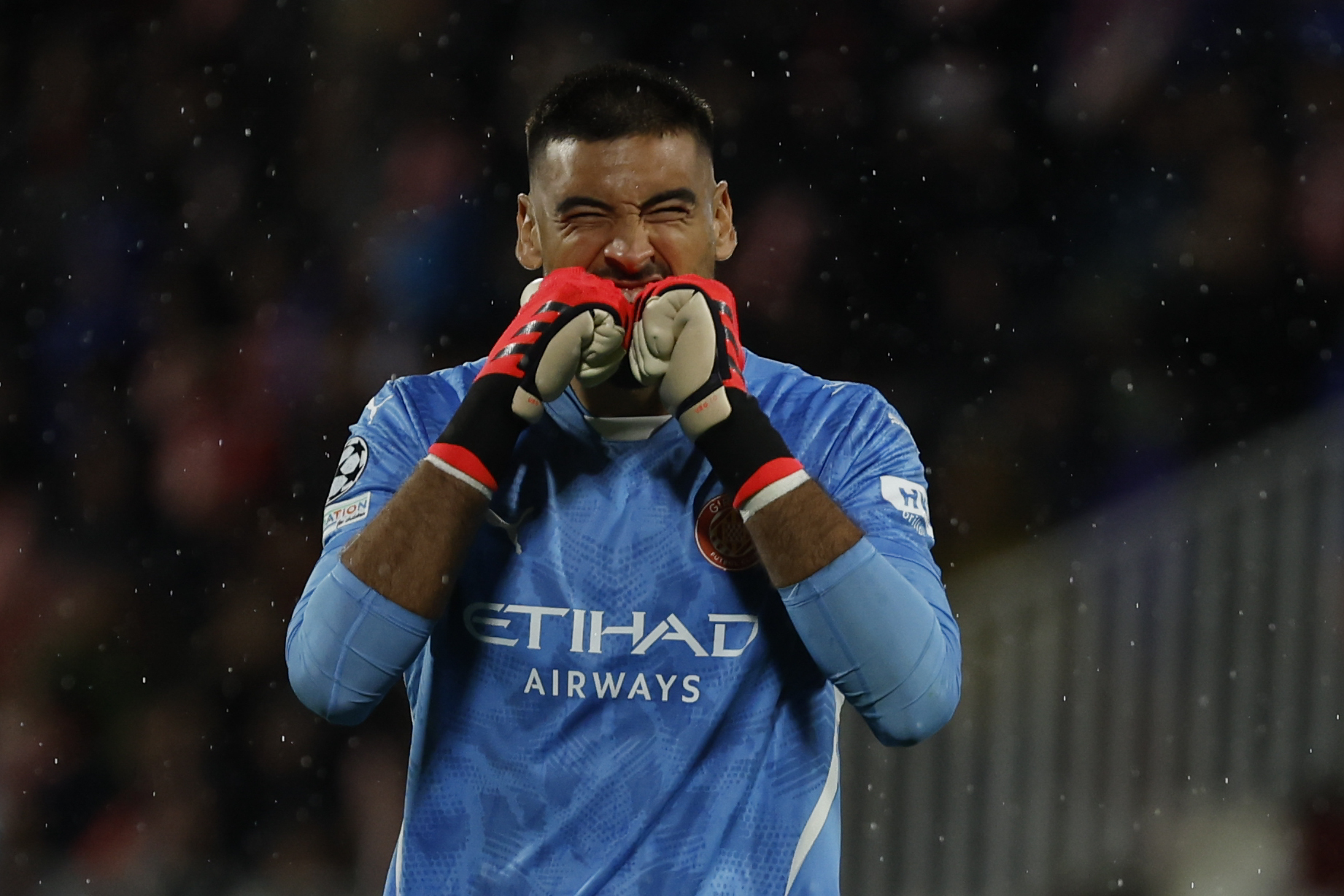 Girona's goalkeeper Paulo Gazzaniga reacts during the Champions League soccer match between Girona and Feyenoord, in Girona, Spain, Wednesday, Oct. 2, 2024.