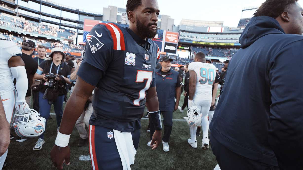 New England Patriots quarterback Jacoby Brissett walks off the field after a 15-10 loss to the Miami Dolphins after an NFL football game, Sunday, Oct. 6, 2024, in Foxborough, Mass.