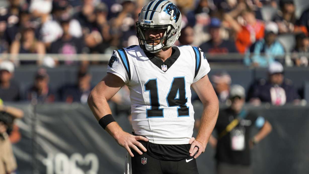Carolina Panthers quarterback Andy Dalton (14) waits for a play against the Chicago Bears during the second half of an NFL football game Sunday, Oct. 6, 2024, in Chicago.