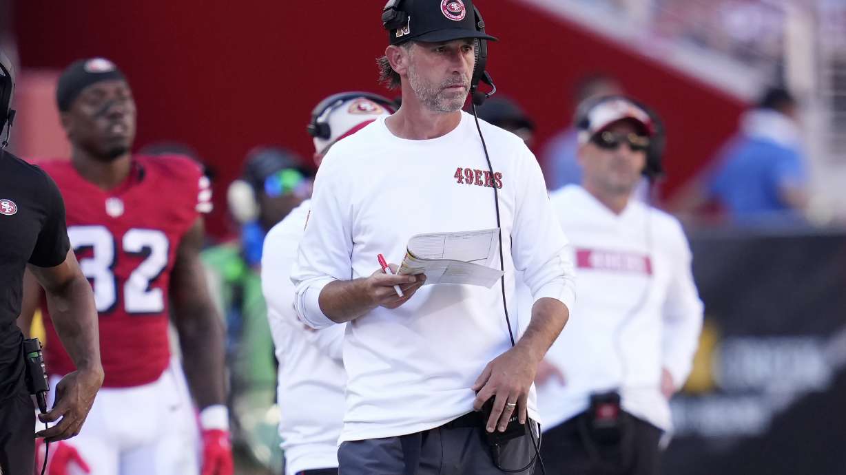 San Francisco 49ers head coach Kyle Shanahan walks on the sideline during the second half of an NFL football game against the Arizona Cardinals in Santa Clara, Calif., Sunday, Oct. 6, 2024.