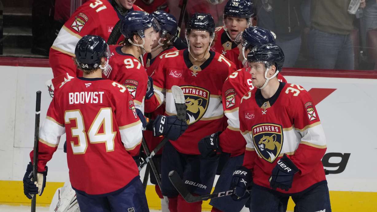 Florida Panthers center Jesper Boqvist (70) celebrates his game winning goal during overtime at a preseason NHL hockey game against the Carolina Hurricanes, Saturday, Sept. 28, 2024, in Sunrise, Fla.