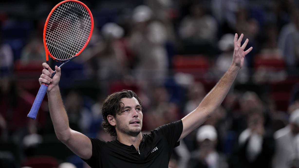 Taylor Fritz of the United States waves to spectators after defeating Terence Atmane of France in the men's singles second round match in the Shanghai Masters tennis tournament at Qizhong Forest Sports City Tennis Center in Shanghai, China, Monday, Oct. 7, 2024.