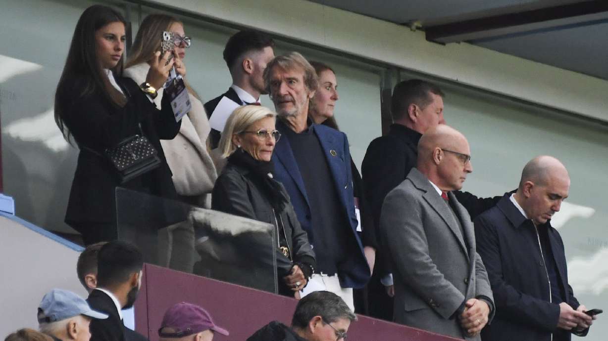 Manchester United owner Sir Jim Ratcliffe, center, looks out from the stands prior the English Premier League soccer match between Aston Villa and Manchester United, at Villa Park in Birmingham, England, Sunday, Oct. 6, 2024.