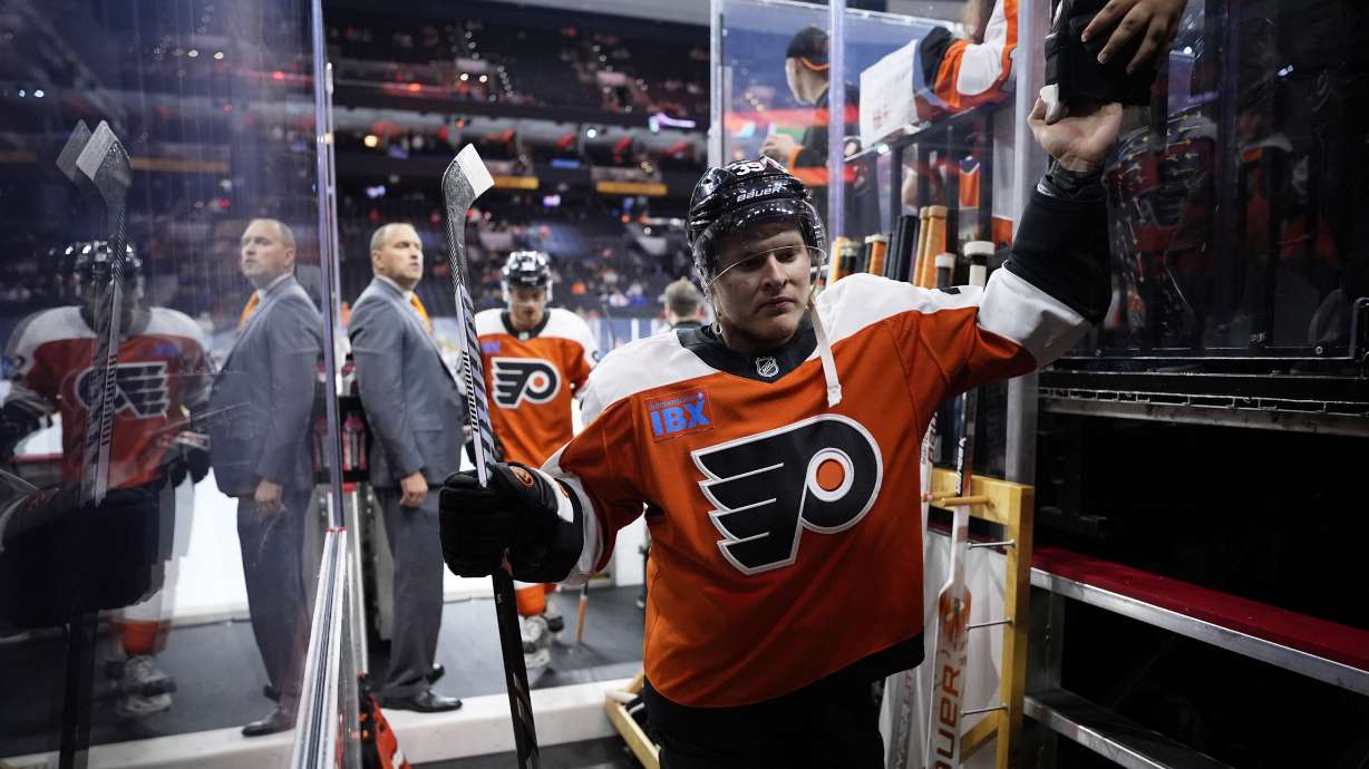 Philadelphia Flyers' Matvei Michkov walks off the ice after warming-up before a preseason NHL hockey game against the New York Islanders, Thursday, Sept. 26, 2024, in Philadelphia.