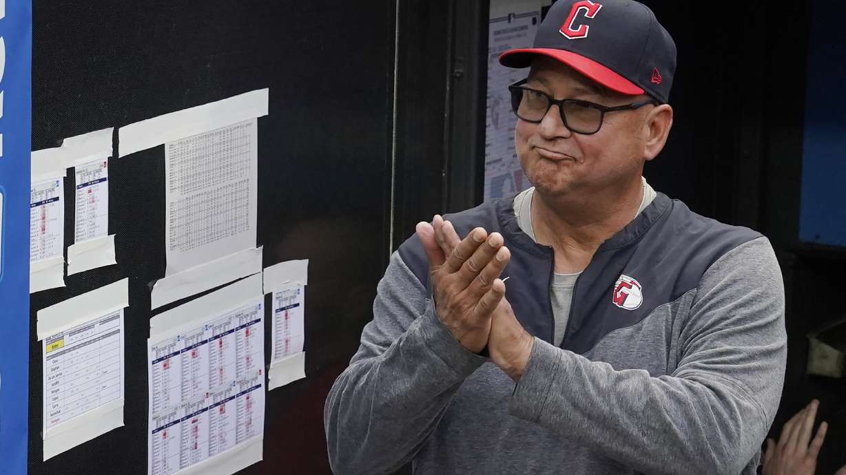 FILE -Cleveland Guardians manager Terry Francona applauds during a tribute video before the team's baseball game against the Cincinnati Reds, Wednesday, Sept. 27, 2023, in Cleveland. Terry Francona has been hired to manage the Cincinnati Reds, returning to the major leagues a year after he stepped down in Cleveland because of health. A person familiar with the situation confirmed the move on Thursday, Oct. 3, 2024 on condition of anonymity because the Reds had not announced the decision.