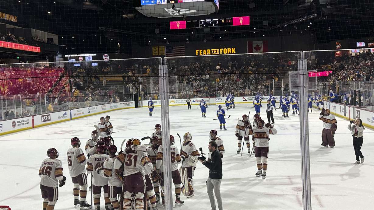 FILE - Arizona State players celebrate after beating Alaska Anchorage in an NCAA college hockey game on Friday, Feb. 9, 2024, at Mullett Arena in Tempe, Arizona.