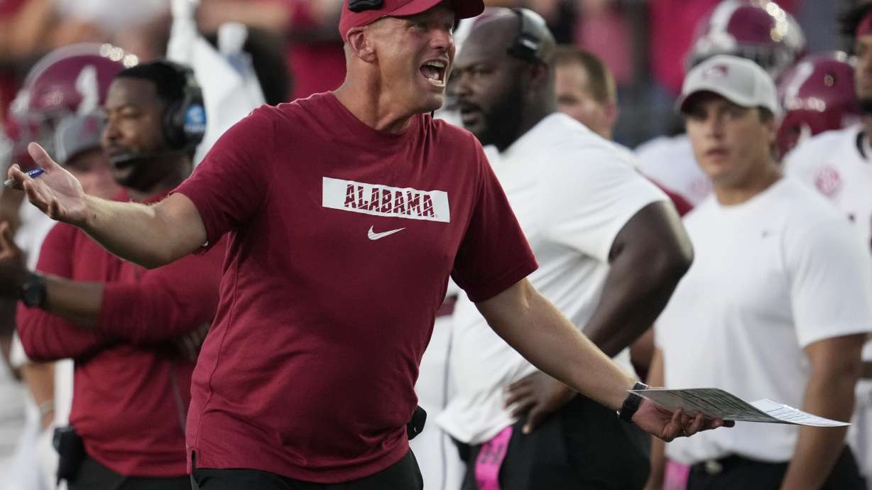 Alabama head coach Kalen DeBoer yells to an official during the second half of an NCAA college football game against Vanderbilt, Saturday, Oct. 5, 2024, in Nashville, Tenn.