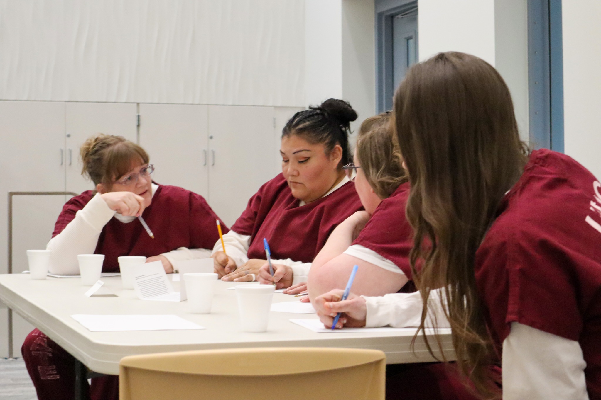 Inmates at the Utah State Correctional Facility participate in a class offered by the Utah Prison Education Project.