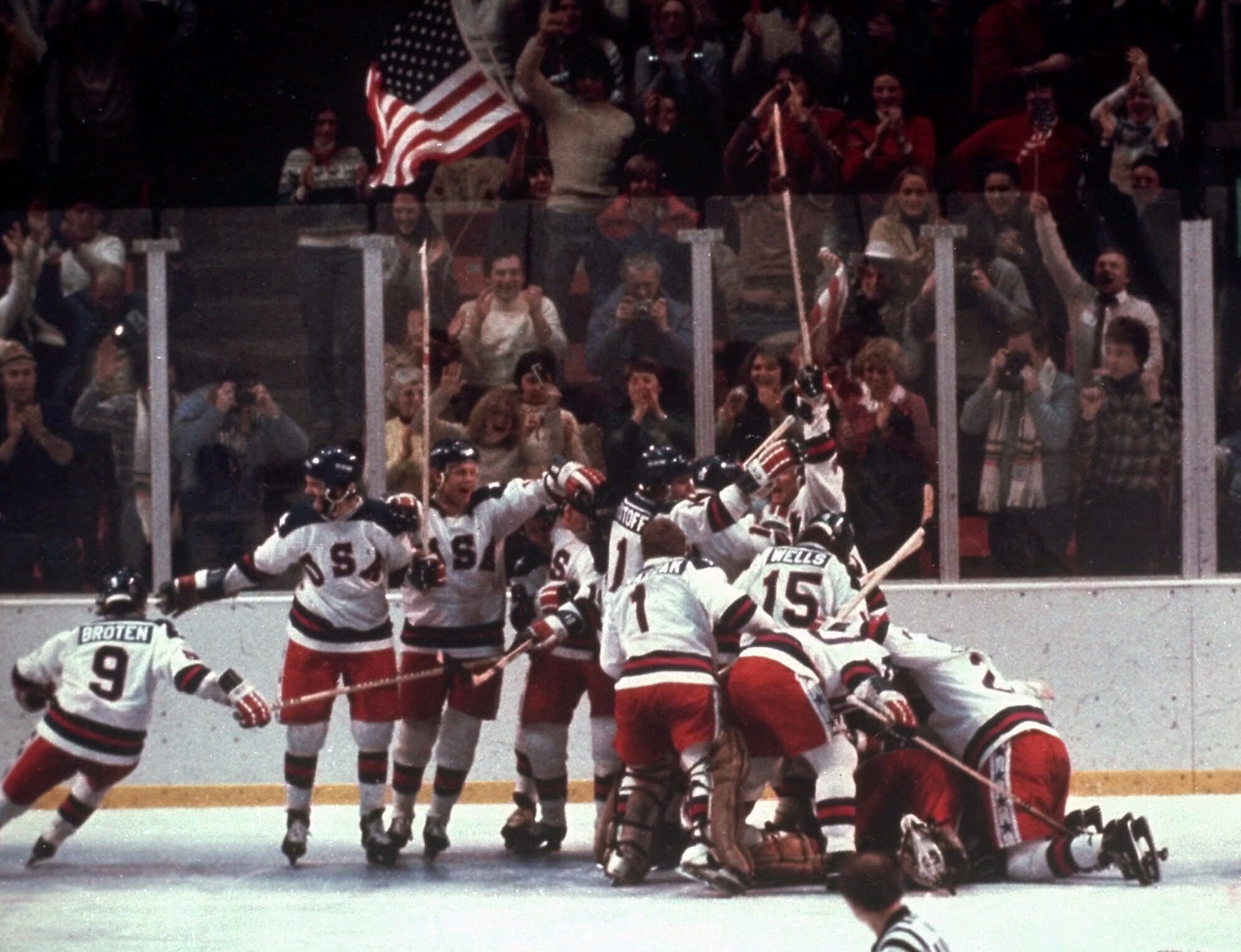 FILE - In this Feb. 22, 1980, file photo, the U.S. hockey team celebrates with goalie Jim Craig after a 4-3 victory against the Soviet Union in a medal round match at the the 1980 Winter Olympics in Lake Placid, N.Y.
