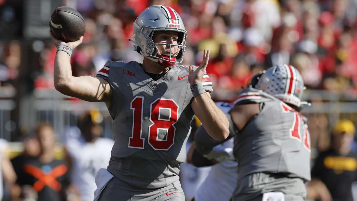Ohio State quarterback Will Howard throws a pass against Iowa during the first half of an NCAA college football game, Saturday, Oct. 5, 2024, in Columbus, Ohio.