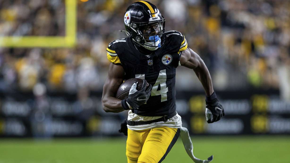 FILE - Pittsburgh Steelers wide receiver George Pickens (14) runs after a catch during an NFL football game, Sunday, Oct. 6, 2024, in Pittsburgh.