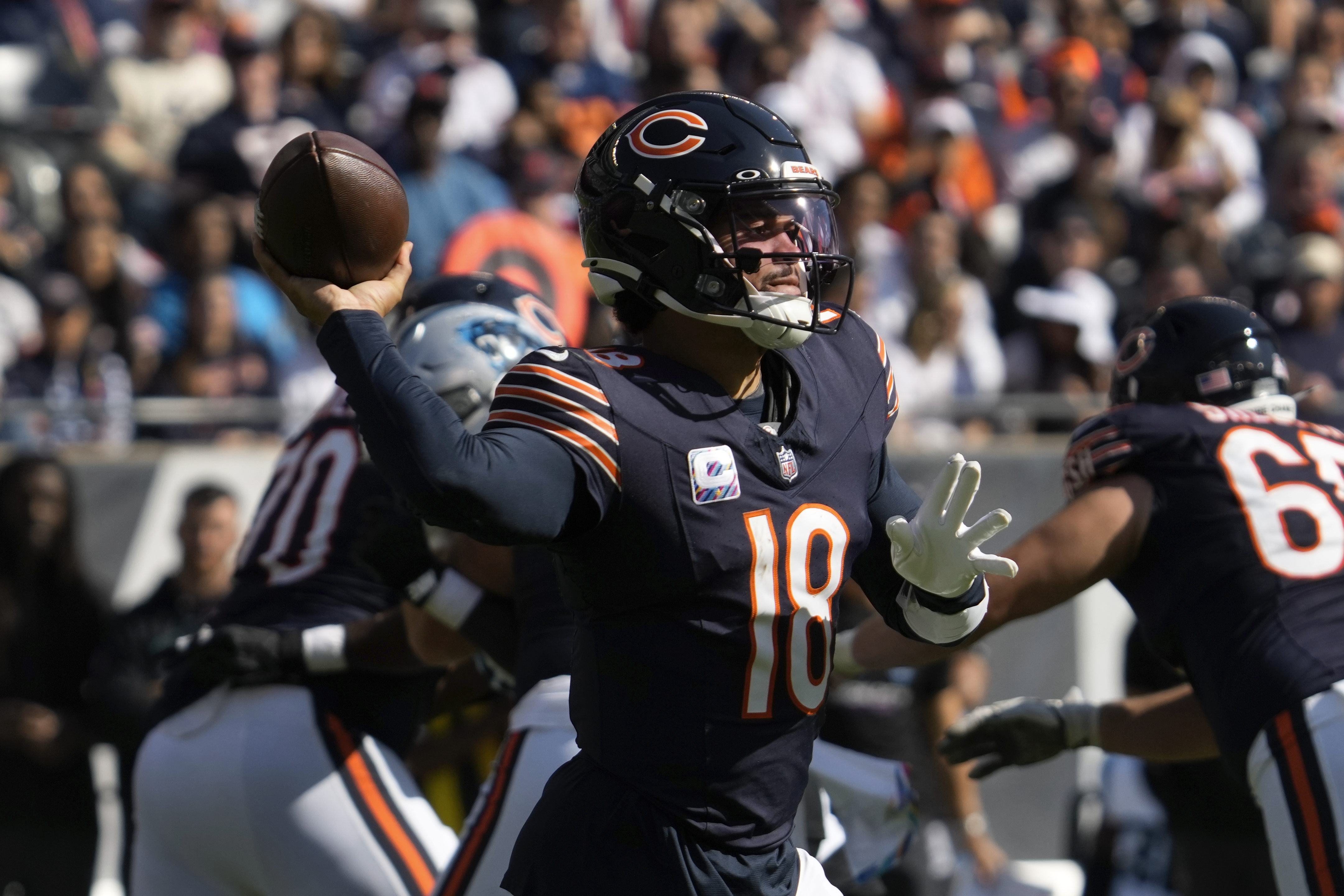Chicago Bears quarterback Caleb Williams (18) throws against the Carolina Panthers during the second half of an NFL football game Sunday, Oct. 6, 2024, in Chicago.
