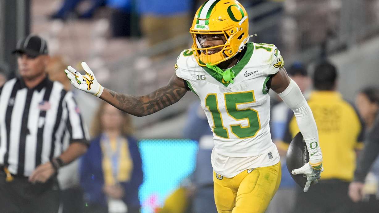 Oregon wide receiver Tez Johnson (15) celebrates after catching a touchdown during the second half of an NCAA college football game against UCLA, Saturday, Sept. 28, 2024, in Pasadena, Calif.
