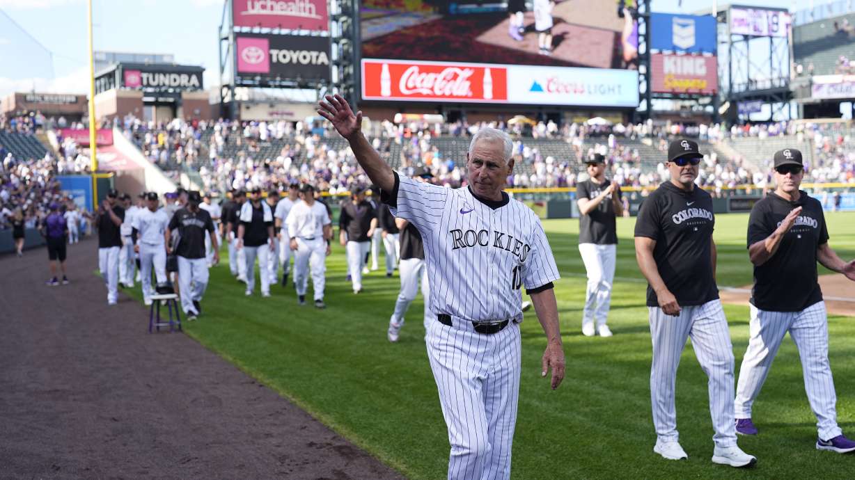 Colorado Rockies manager Bud Black waves to the crowd during the team's ceremonial walk around the field to acknowledge fans following a loss in the team's season finale Sunday, Sept. 29, 2024, in Denver.