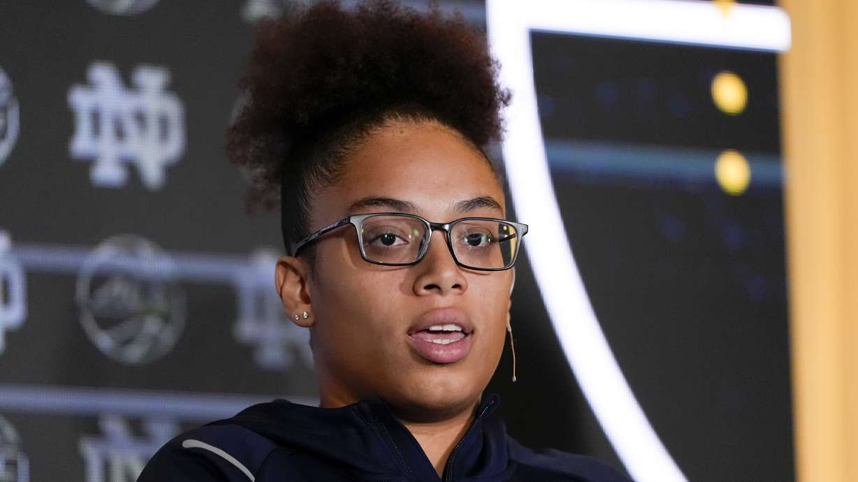 Notre Dame guard Olivia Miles speaks during a ACC women's NCAA college basketball media day, Tuesday, Oct. 8, 2024, in Charlotte, N.C.