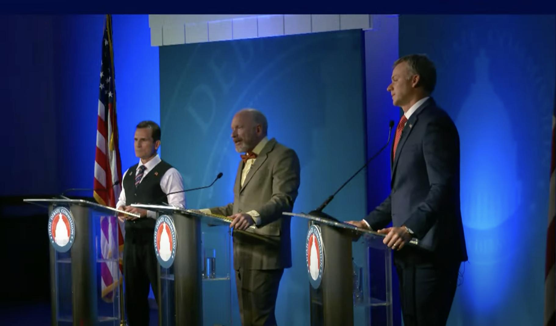 Candidates Bill Campbell, Daniel Cottam and Blake Moore debate solutions to immigration, fiscal spending and housing Tuesday night at Utah State University.