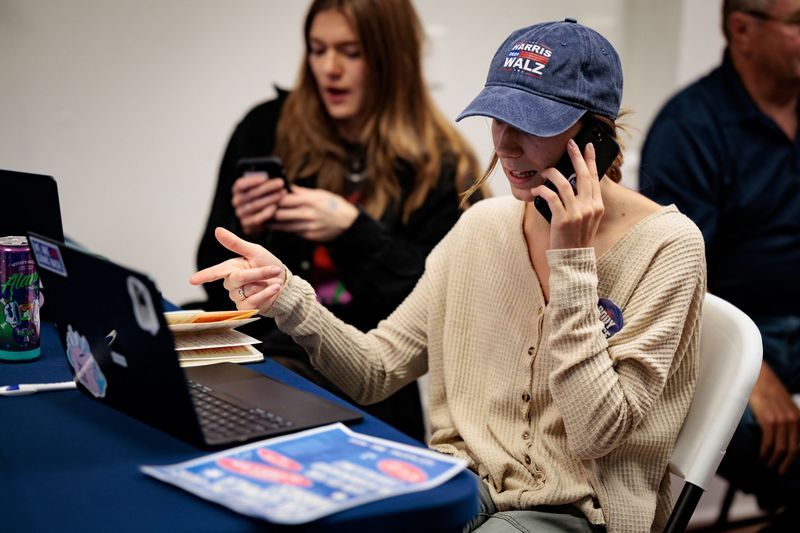 Field Organizer for the Harris campaign Hanna Oleski contacts voters by phone at the Erie County Harris campaign headquarters in Erie, Pa., Sept. 25.