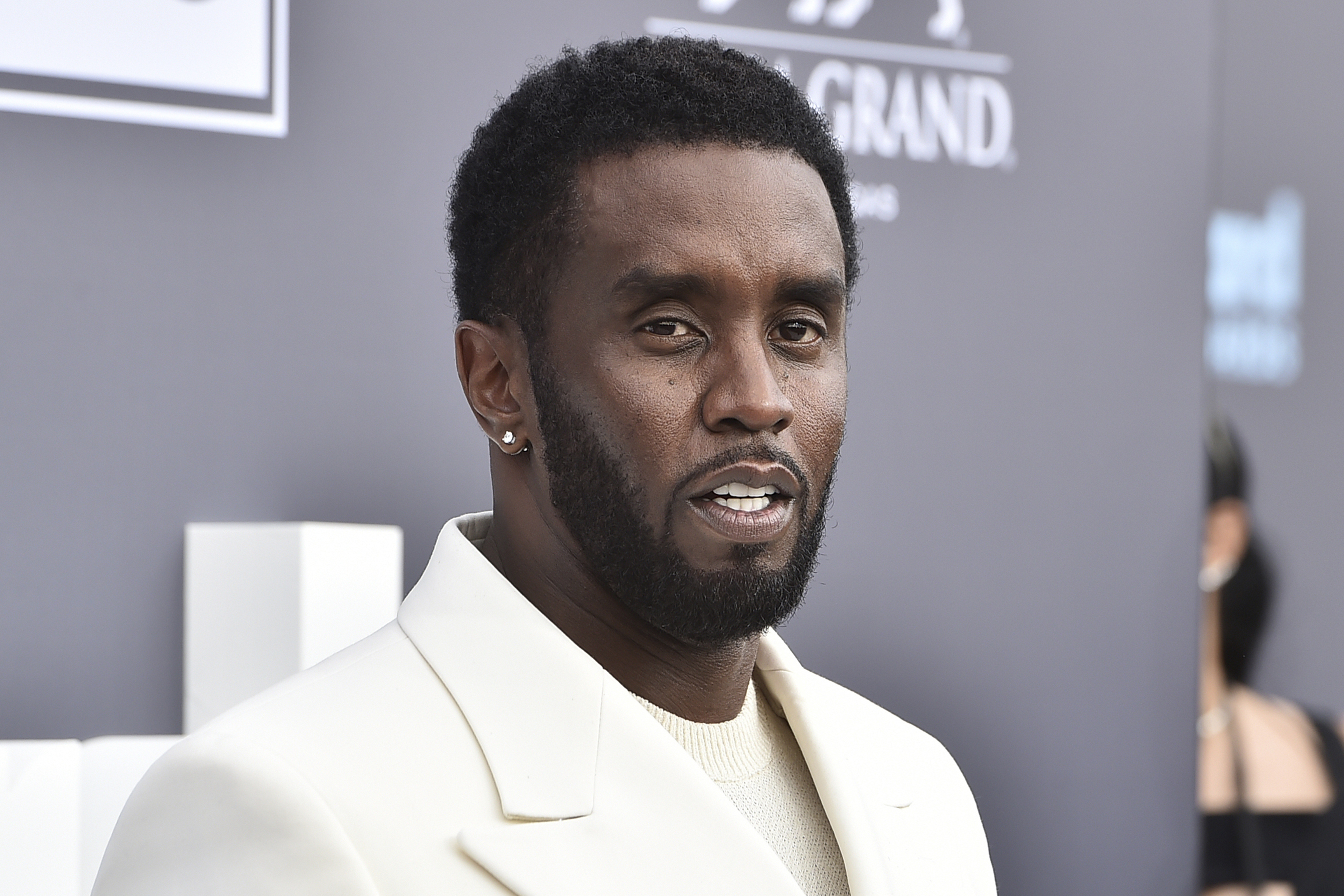 Music mogul and entrepreneur Sean "Diddy" Combs arrives at the Billboard Music Awards, May 15, 2022, in Las Vegas. Combs wants to go to trial on sex trafficking charges next spring, his lawyers said.