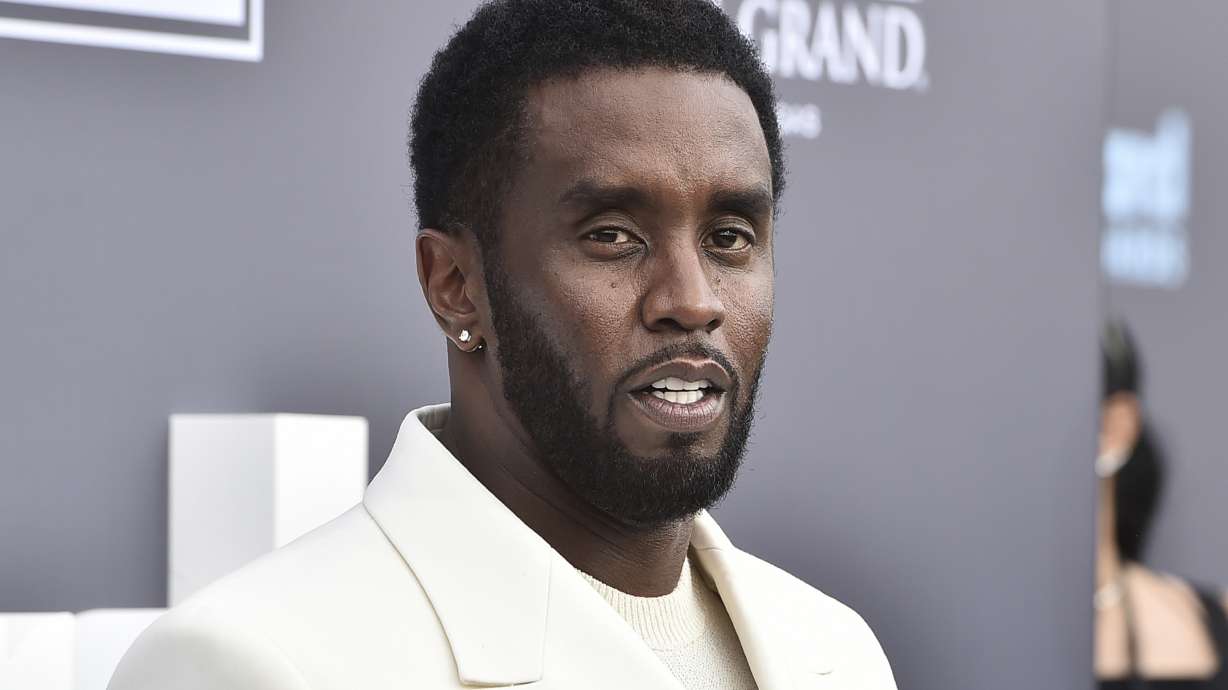 Music mogul and entrepreneur Sean "Diddy" Combs arrives at the Billboard Music Awards, May 15, 2022, in Las Vegas. Combs wants to go to trial on sex trafficking charges next spring, his lawyers said.