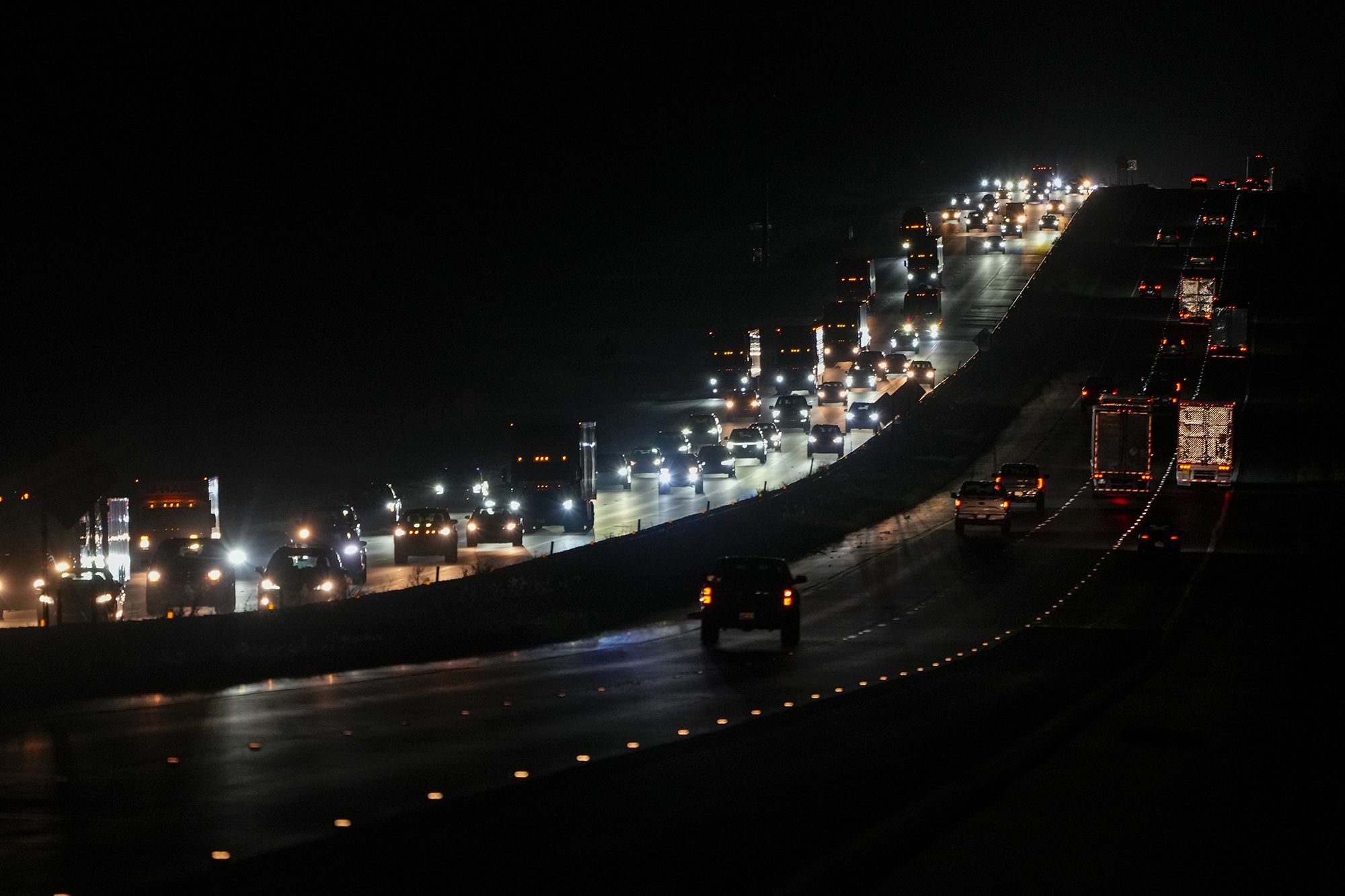 Heavy traffic flows northbound on Interstate-75 as people evacuate the Tampa Bay area late Tuesday ahead of Hurricane Milton's arrival.