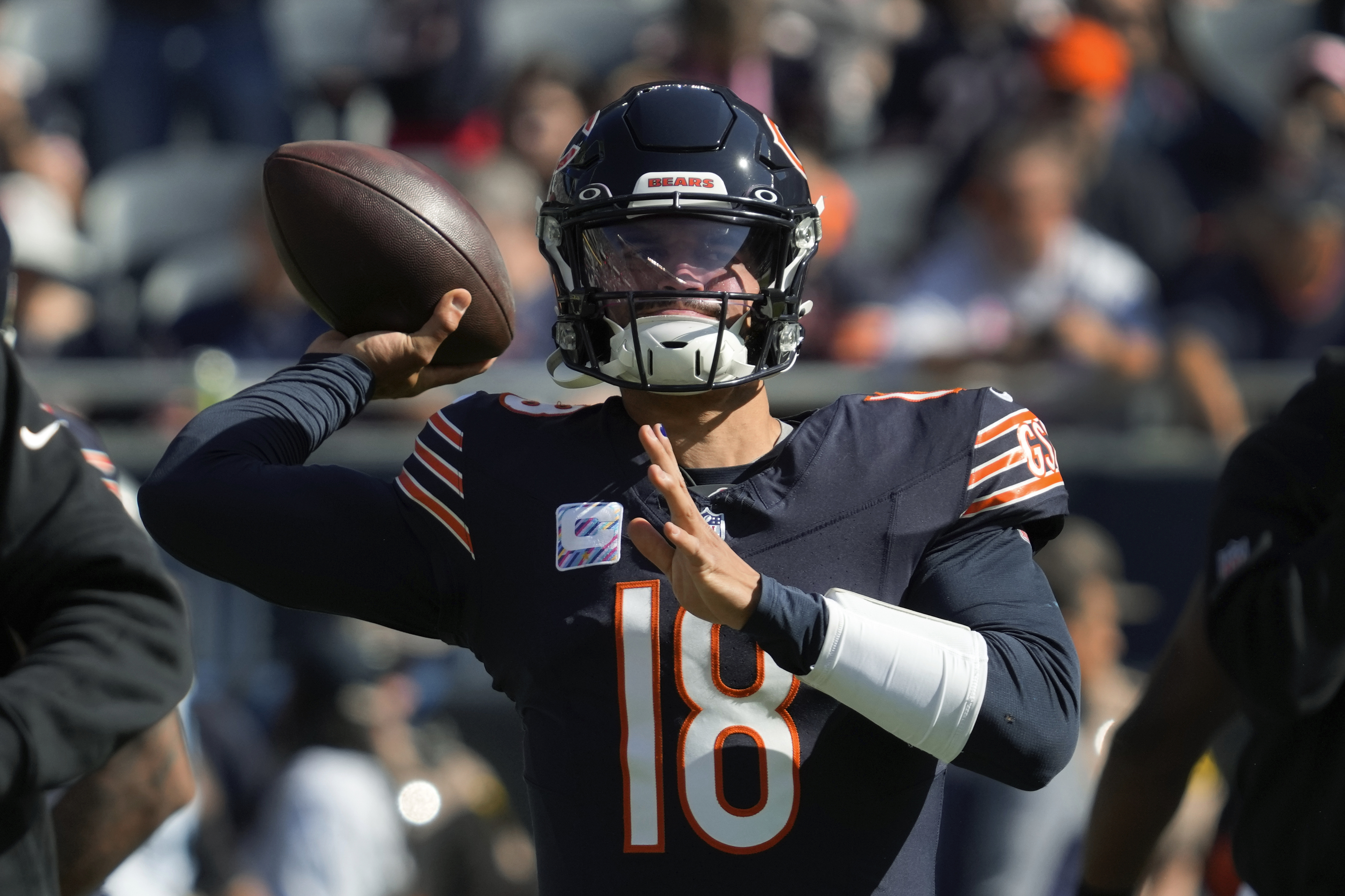 Chicago Bears quarterback Caleb Williams throws before an NFL football game against the Carolina Panthers Sunday, Oct. 6, 2024, in Chicago.