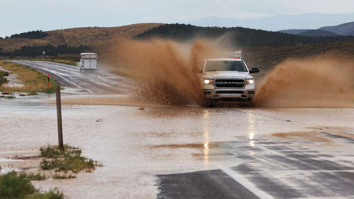 Motorists make their way on highway 50 near Scipio after a heavy rain and hail storm on Aug. 13. A report examined how this last water year for Utah was good in terms of precipitation or snowpack.