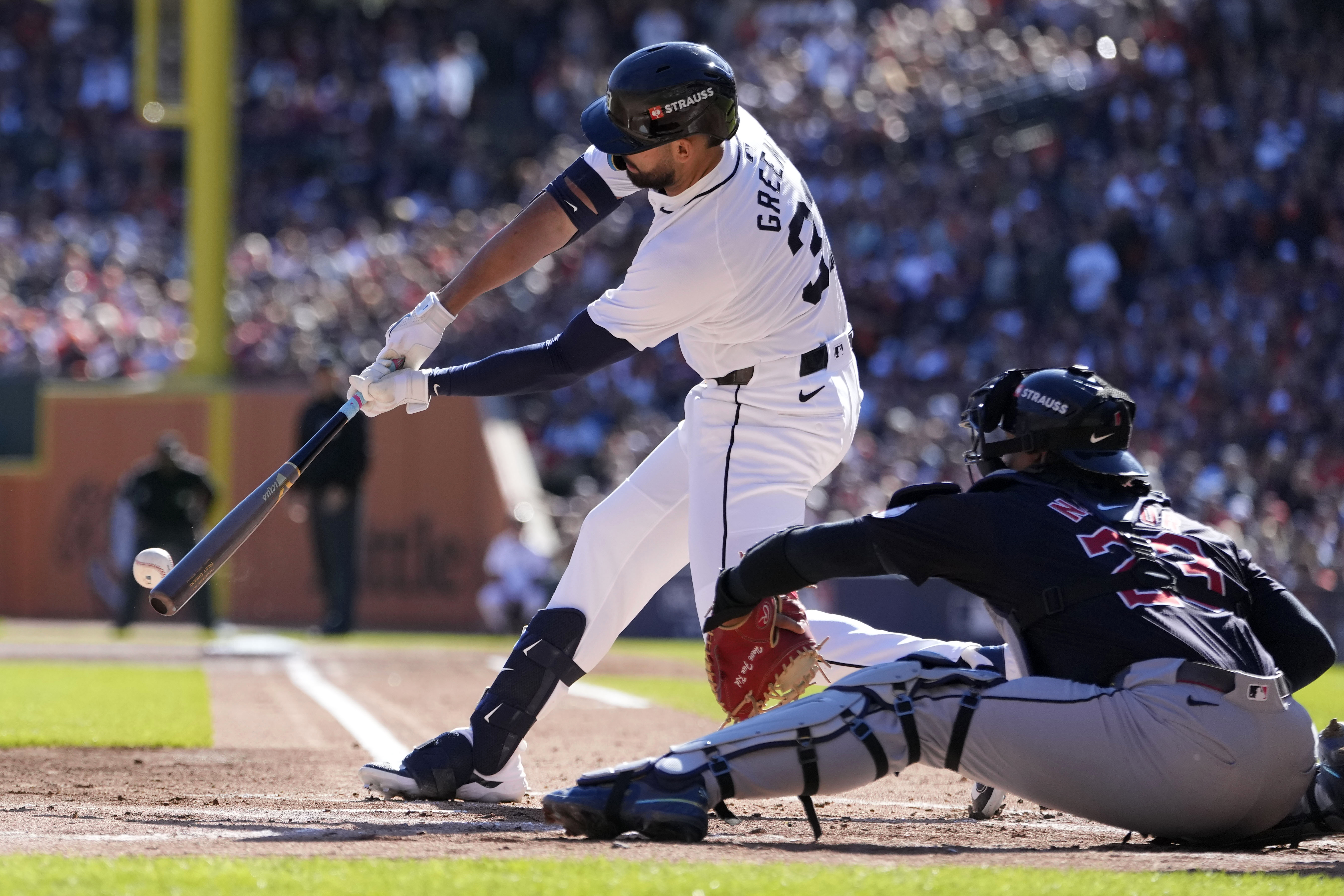 Detroit Tigers' Riley Greene hits an RBI single in the first inning during Game 3 of a baseball American League Division Series against the Cleveland Guardians, Wednesday, Oct. 9, 2024, in Detroit.