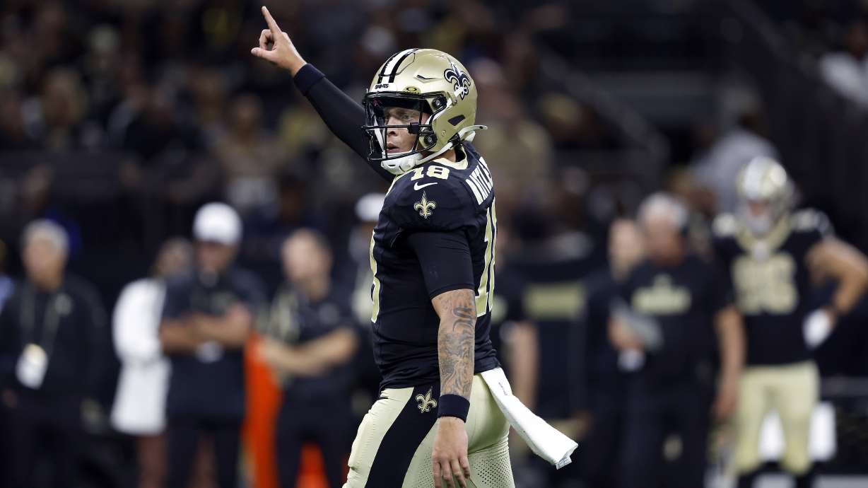 FILE - New Orleans Saints quarterback Spencer Rattler (18) reacts to a play during an NFL preseason football game against the Tennessee Titans, Aug. 25, 2024, in New Orleans.