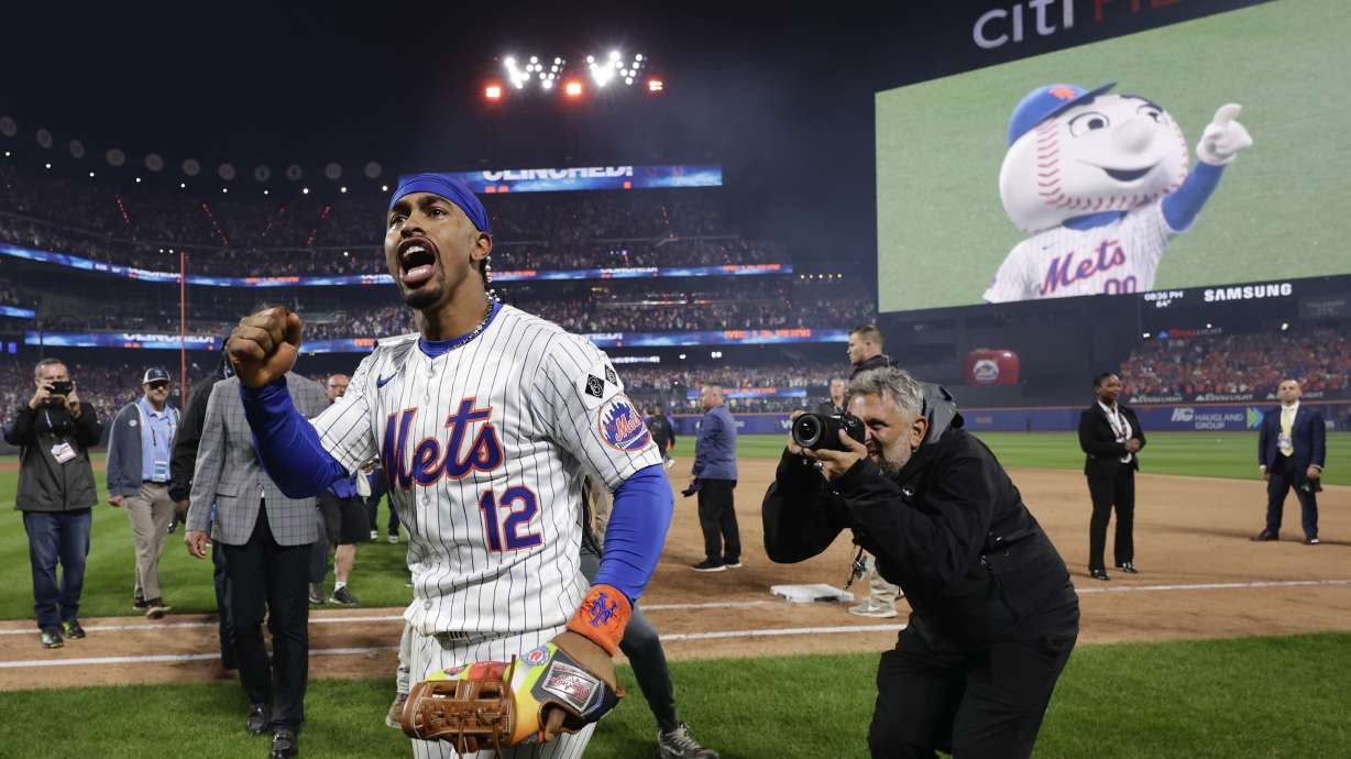 New York Mets shortstop Francisco Lindor (12) celebrates after the Mets beat the Philadelphia Phillies in Game 4 of the National League baseball playoff series, Wednesday, Oct. 9, 2024, in New York.