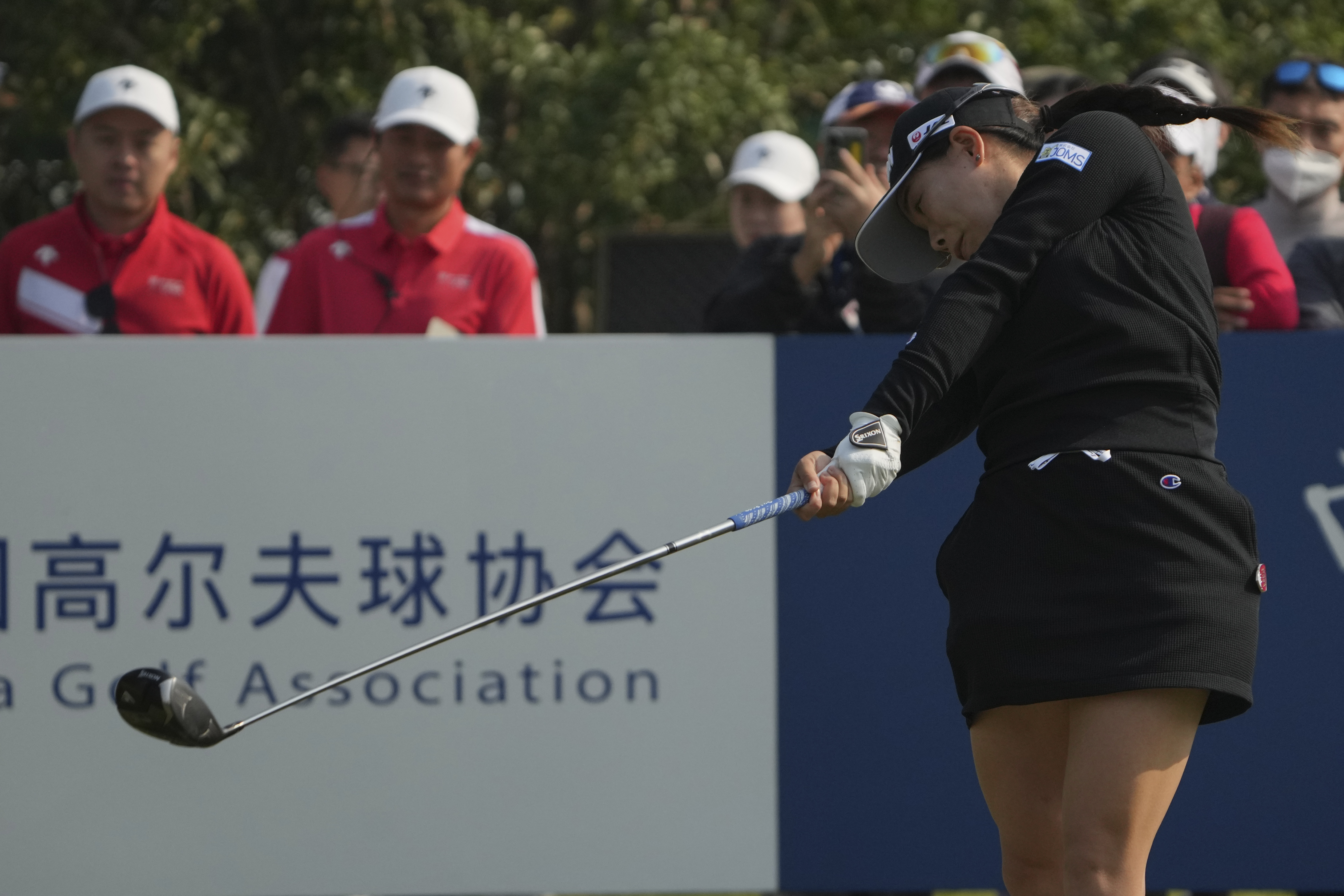 Minami Katsu of Japan tees off on the first hole during the first round of the Buick LPGA Shanghai at Shanghai Qizhong Garden Golf Club in Shanghai, China, Thursday, Oct. 10, 2024.