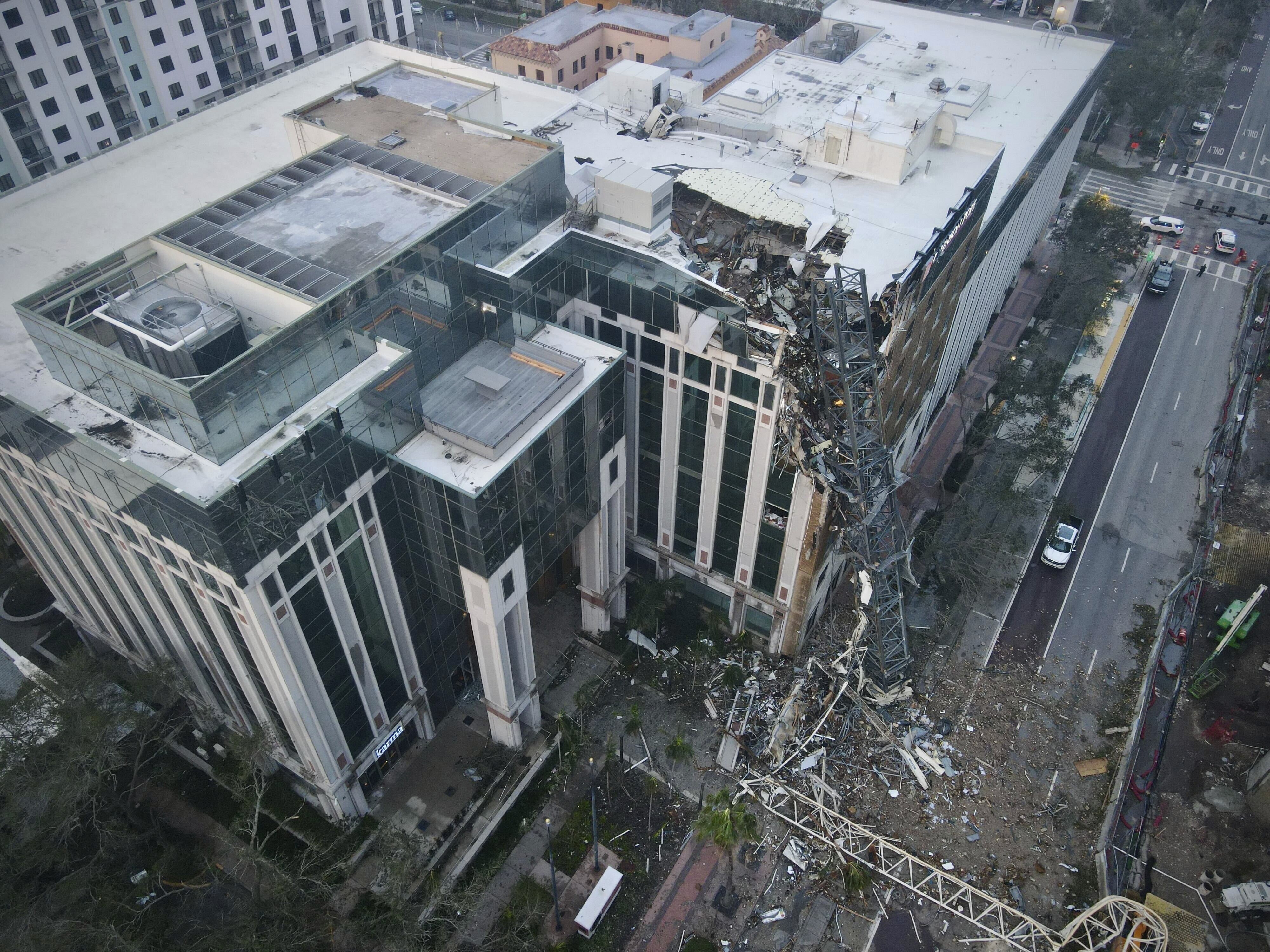 A construction crane fell over into an office building that houses the Tampa Bay Times headquarters, Thursday.