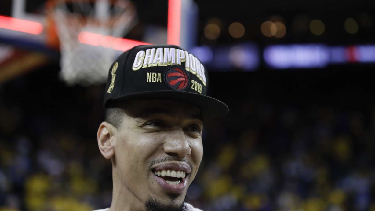 FILE - Toronto Raptors guard Danny Green celebrates after the Raptors defeated the Golden State Warriors Game 6 of basketball's NBA Finals in Oakland, Calif., Thursday, June 13, 2019.