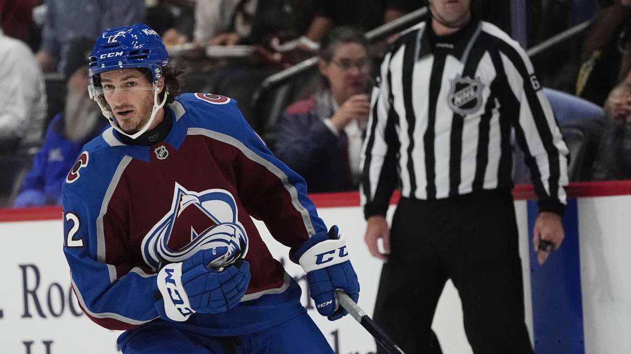 Center Jayson Megna, shown playing for the Colorado Avalanche in the first period of an NHL preseason hockey game Monday, Sept. 23, 2024, wears a cut-resistant neck protector while facing the Dallas Stars in Denver.