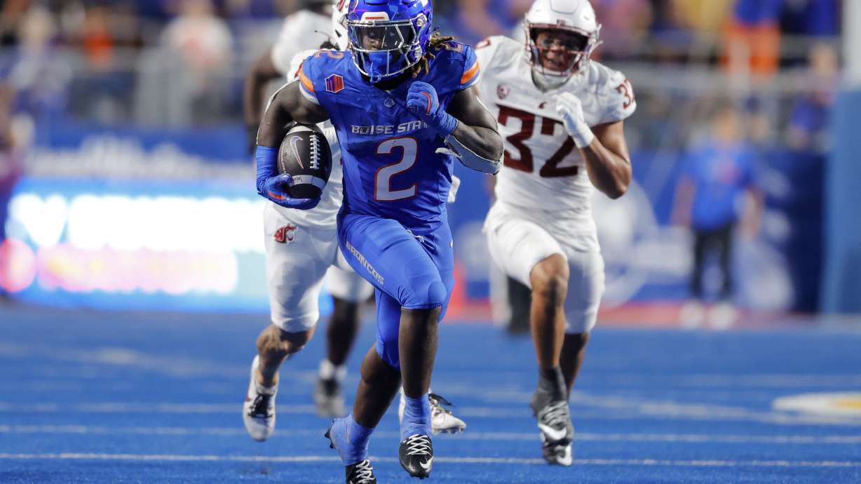 Boise State running back Ashton Jeanty (2) breaks away from the Washington State defense in the second half of an NCAA college football game, Saturday, Sept. 28, 2024, in Boise, Idaho.