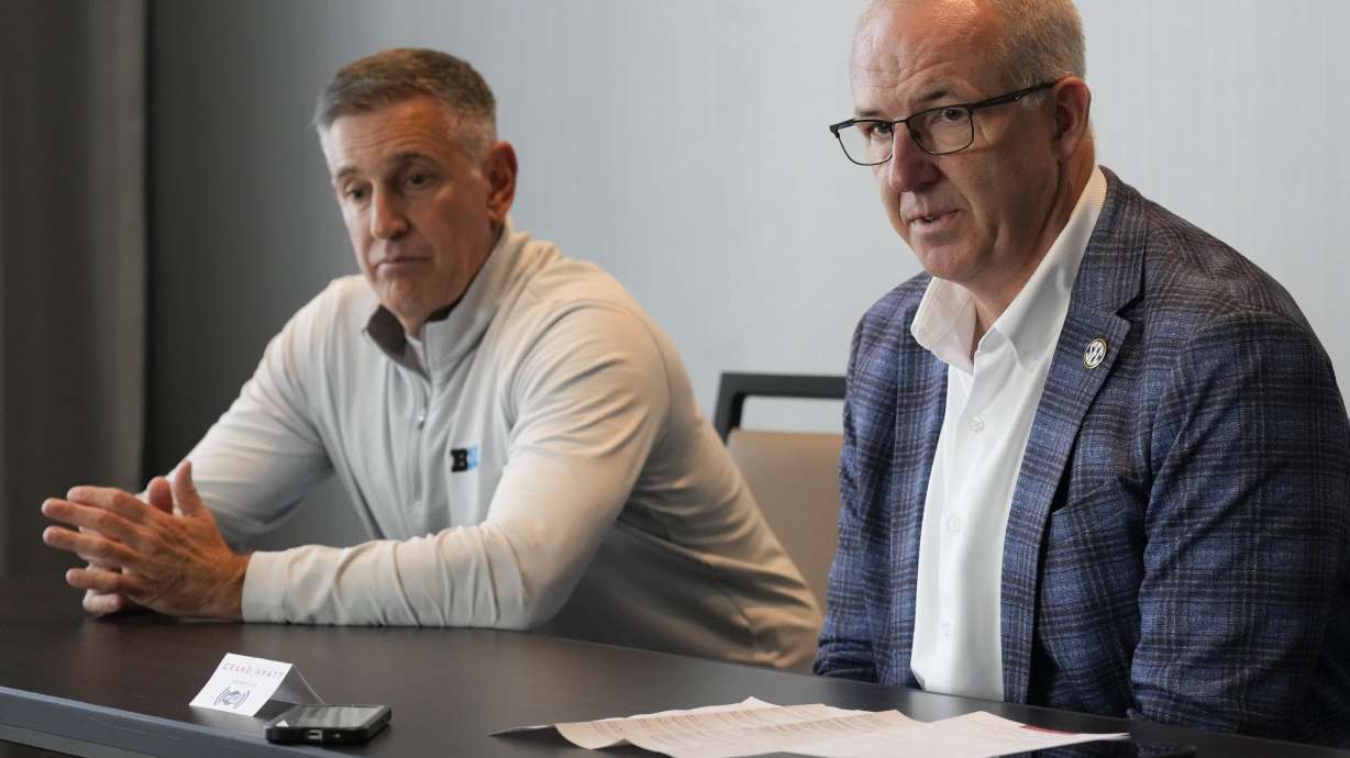 Big Ten Conference commissioner Tony Petitti, left, and Southeastern Conference commissioner Greg Sankey, right, hold a news conference after the two conferences held meetings Thursday, Oct. 10, 2024, in Nashville, Tenn.