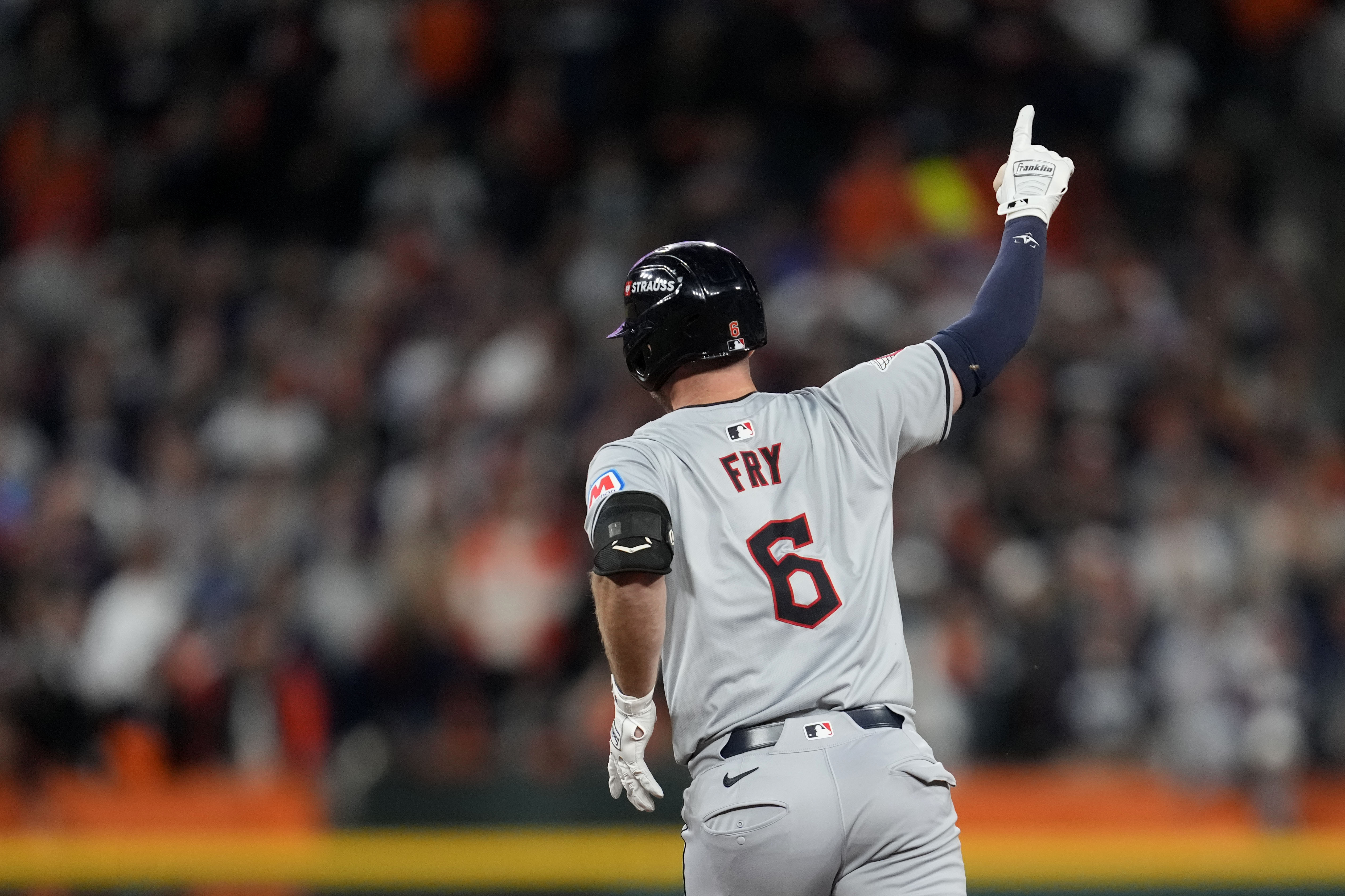 Cleveland Guardians' David Fry celebrates after hitting a two-run home run in the seventh inning during Game 4 of a baseball American League Division Series against the Detroit Tigers, Thursday, Oct. 10, 2024, in Detroit.