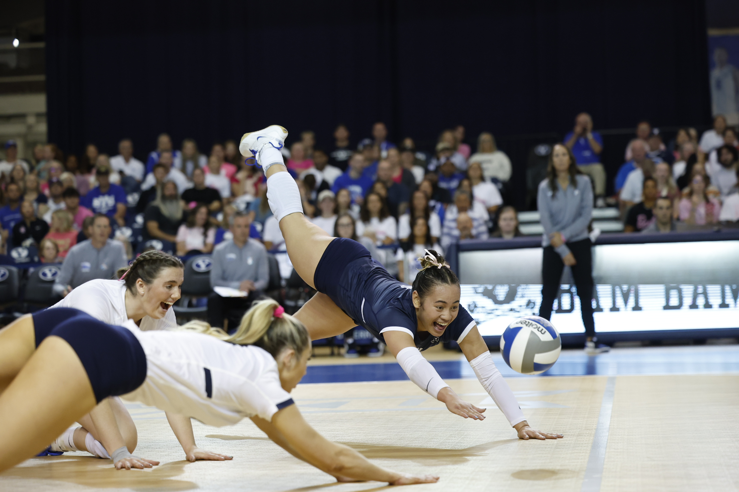 BYU libero Lulu Uluave dives after a ball during a Big 12 women's volleyball match against No. 18 Baylor, Thursday, Oct. 10, 2024 at the Smith Fieldhouse in Provo, Utah.