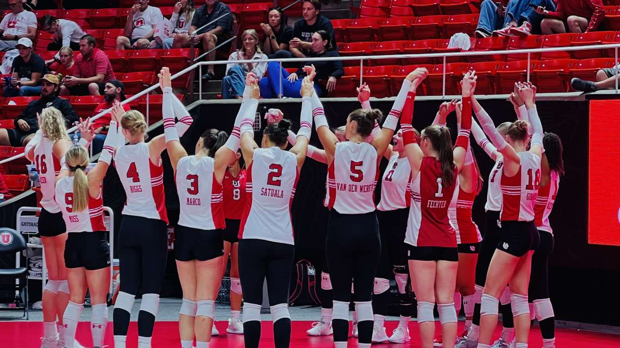 The Utes join hands, getting ready for their big game against TCU.