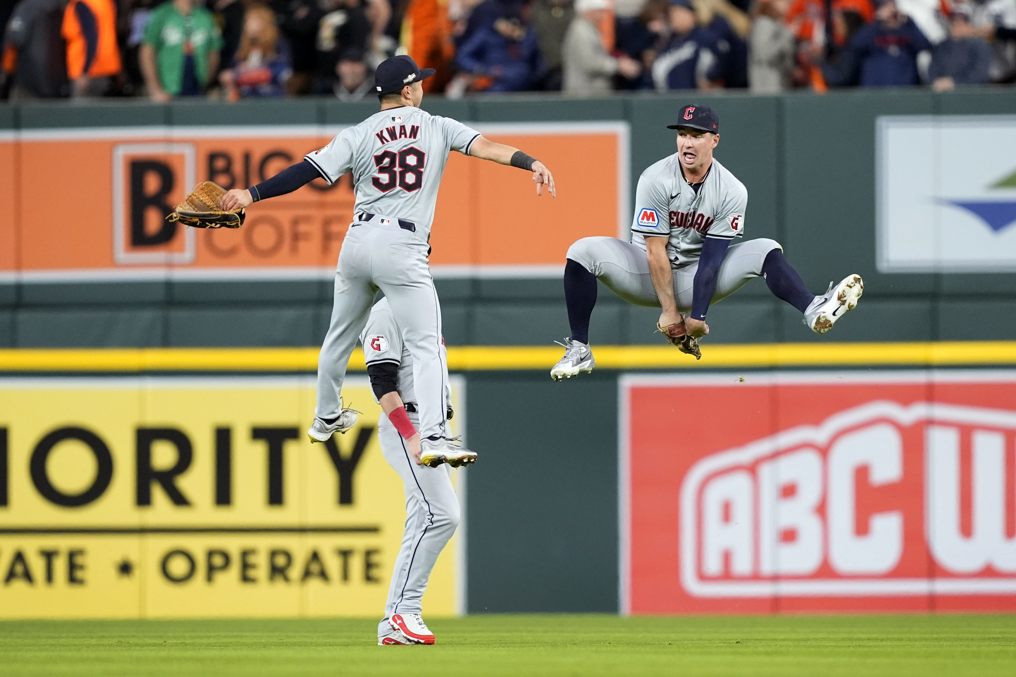 Cleveland Guardians' Steven Kwan (38) celebrates with teammate Will Brennan, right, at the end of Game 4 of a baseball American League Division Series against the Detroit Tigers, Thursday, Oct. 10, 2024, in Detroit. The Guardians won 5-4.