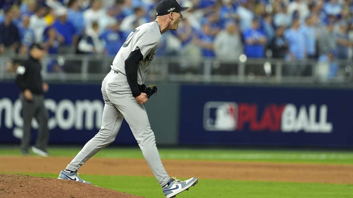 New York Yankees relief pitcher Luke Weaver celebrates the final out in a 3-1 victory over the Kansas City Royals in Game 4 of an American League Division baseball playoff series Thursday, Oct. 10, 2024, in Kansas City, Mo.